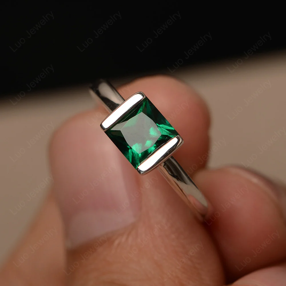 Emerald Half Bezel Solitaire Engagement Ring