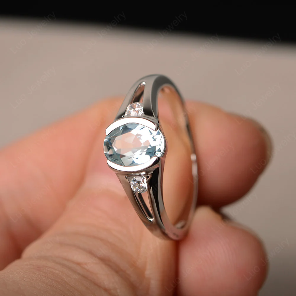 Half Bezel Set Oval Aquamarine Ring