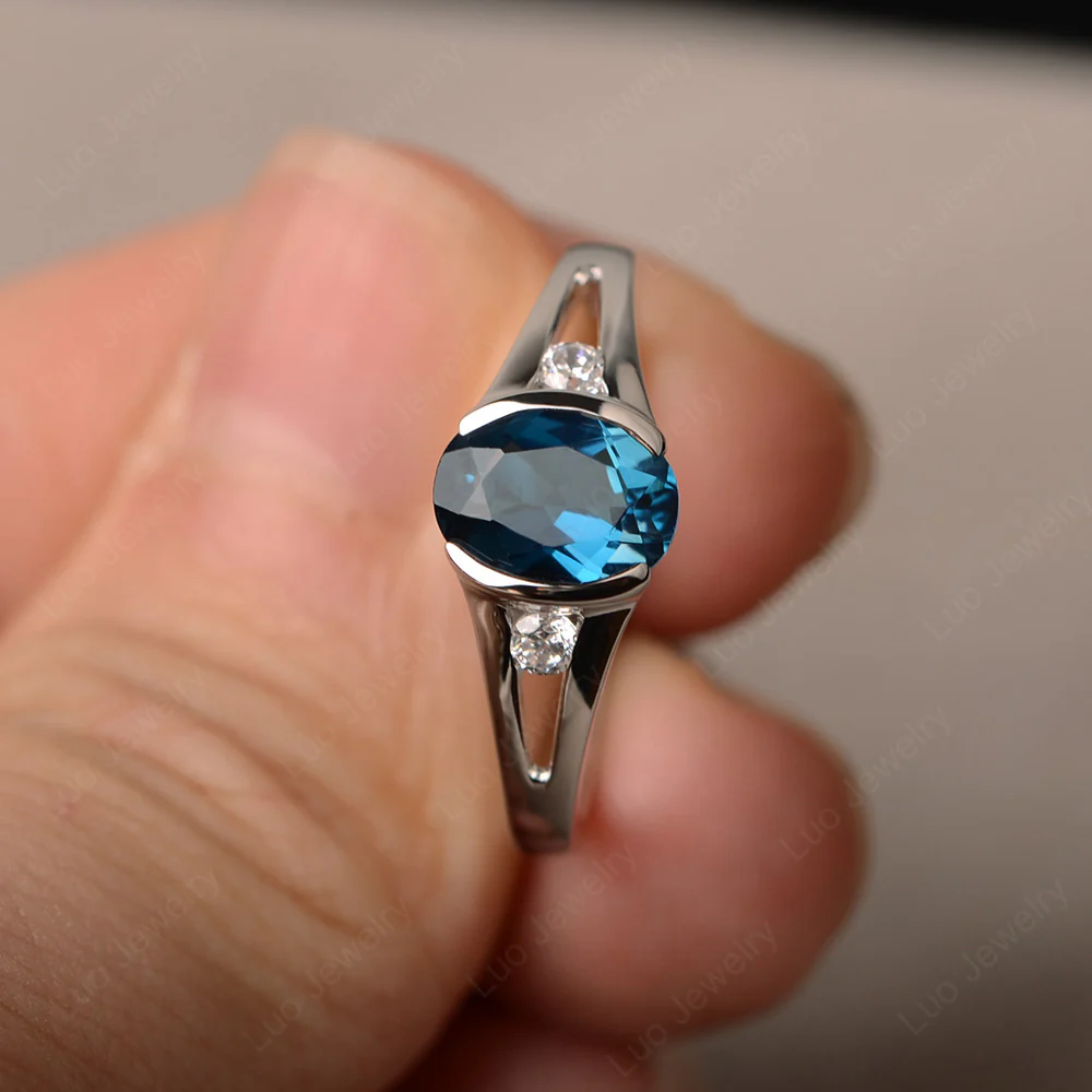 Half Bezel Set Oval London Blue Topaz Ring - Image 2