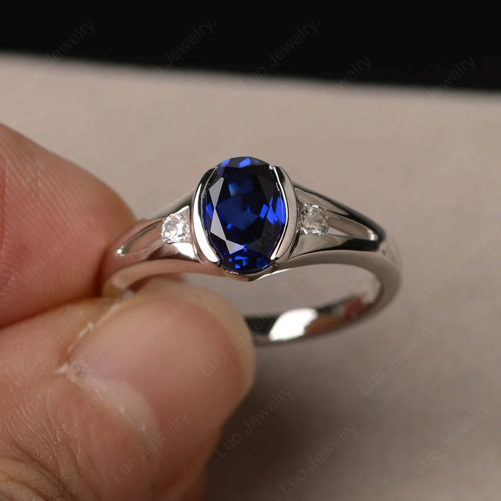 Half Bezel Set Oval Sapphire Ring