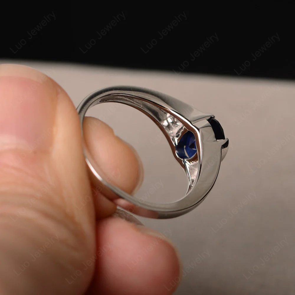 Half Bezel Set Oval Sapphire Ring - Image 3