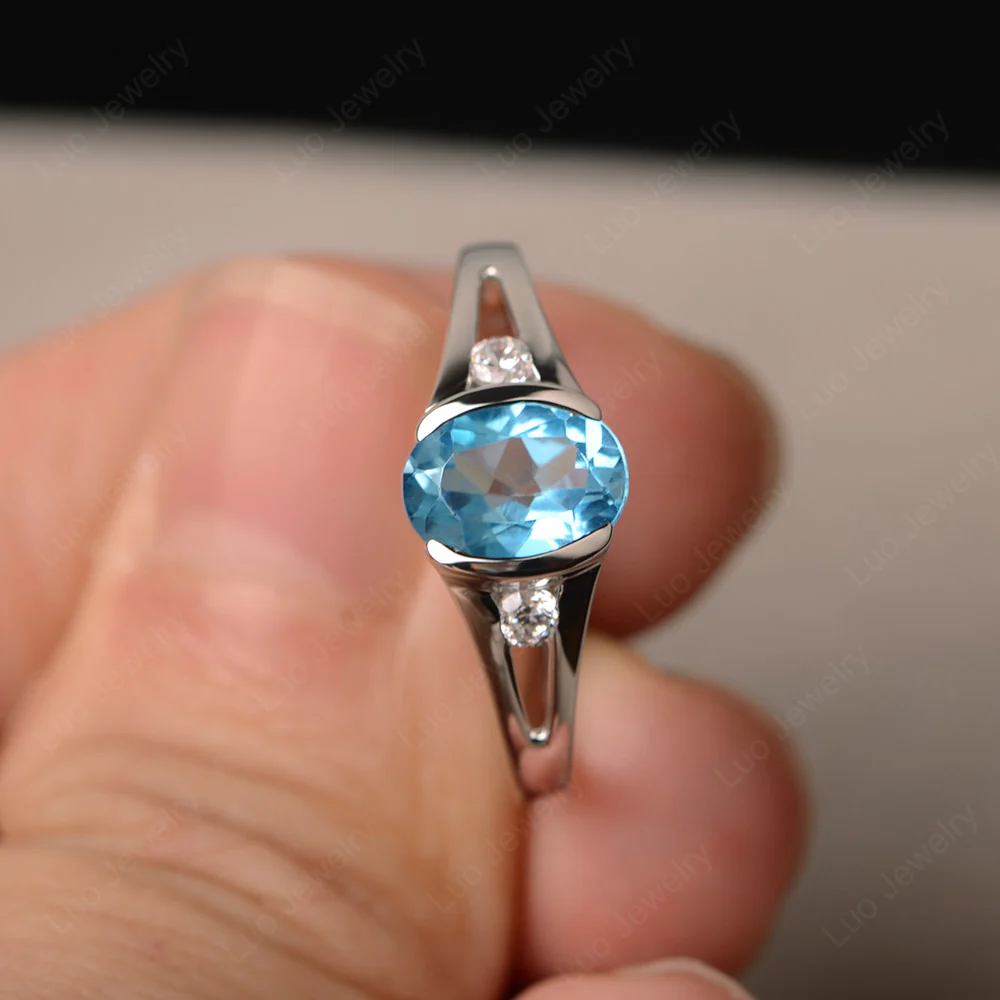 Half Bezel Set Oval Swiss Blue Topaz Ring