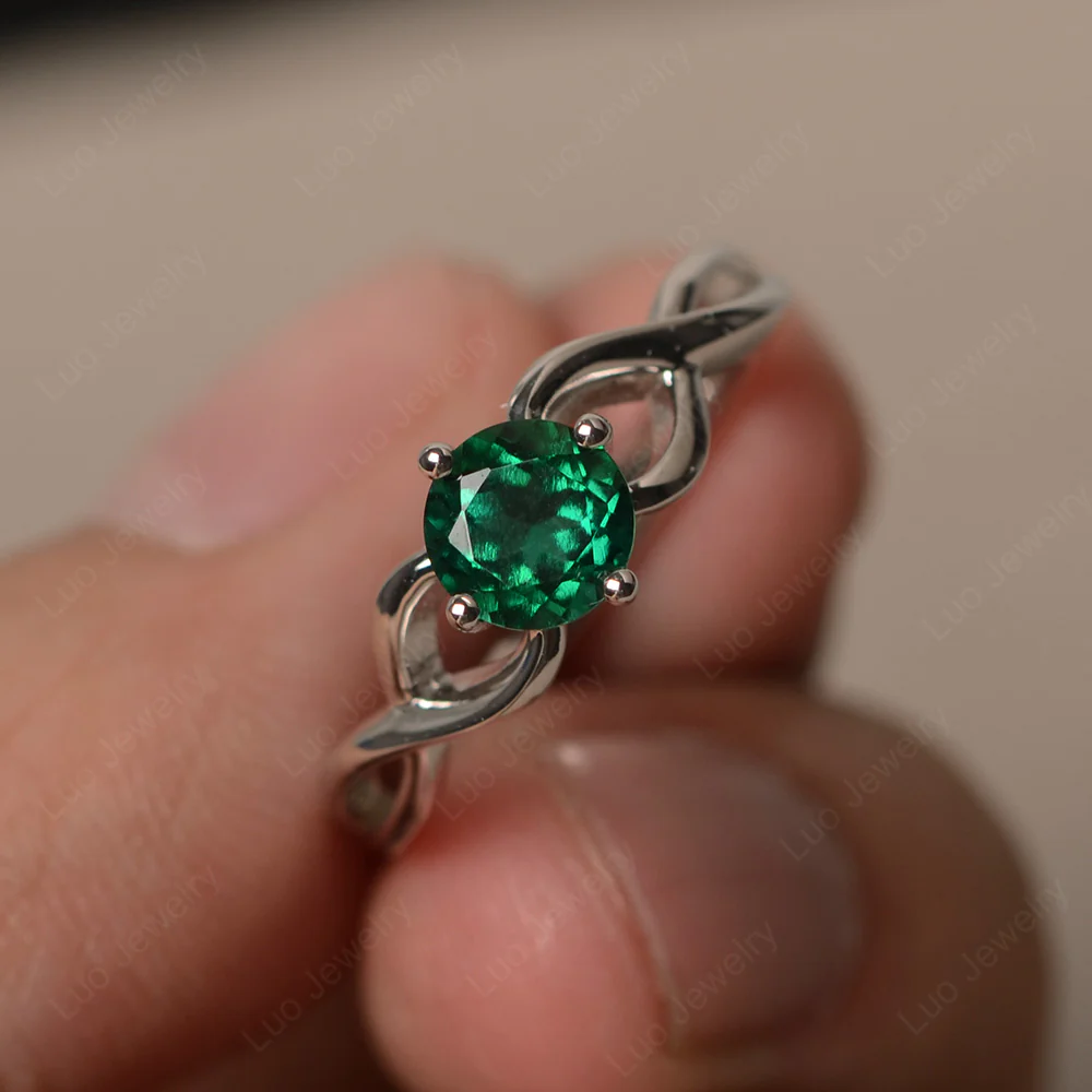 Round Emerald Twist Solitaire Ring