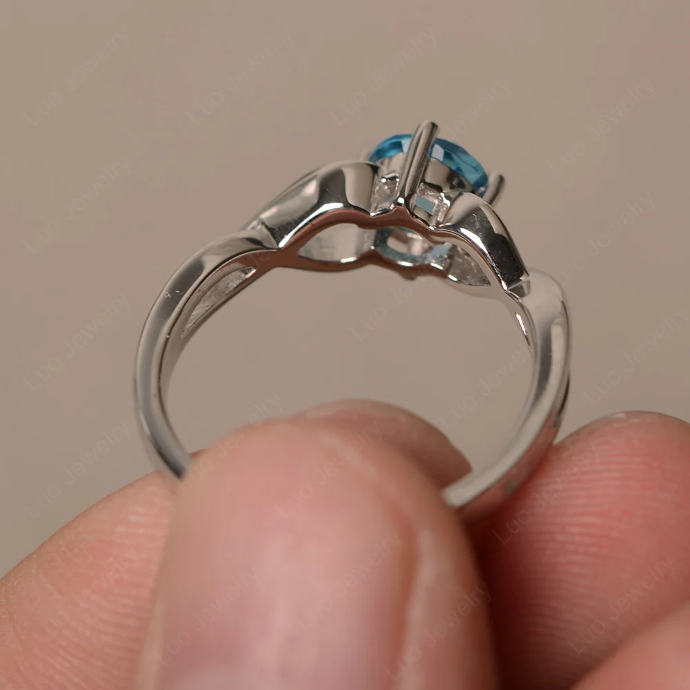 Round Swiss Blue Topaz Twist Solitaire Ring - Image 2