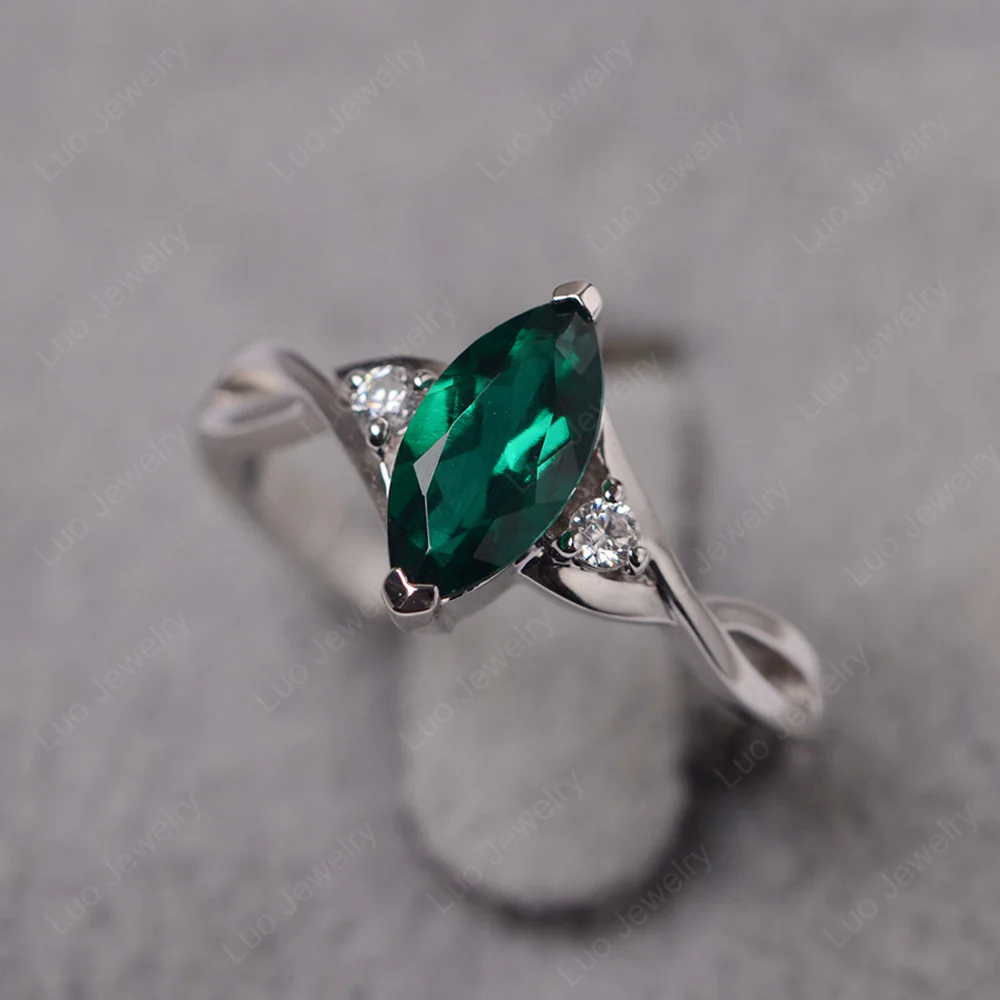 Emerald Marquise Twist Engagement Ring