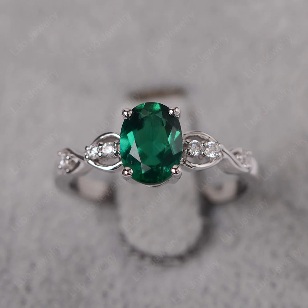 Oval Emerald Infinity Engagement Ring