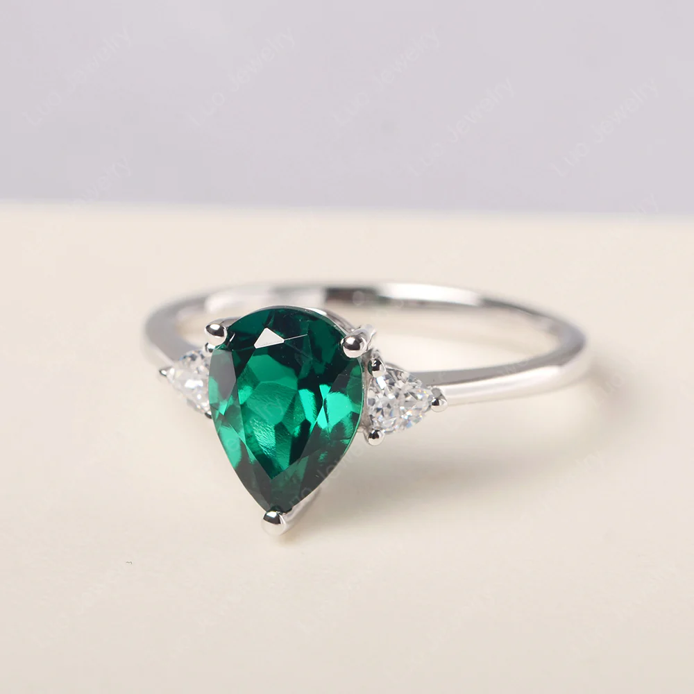 Teardrop Emerald Trilogy Ring - Image 2