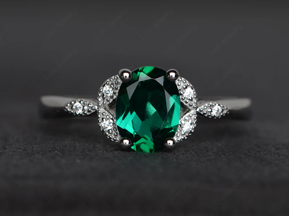 Oval Emerald Leaf Engagement Ring