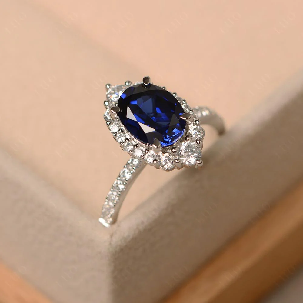 Oval Sapphire Halo Cluster Ring - Image 11