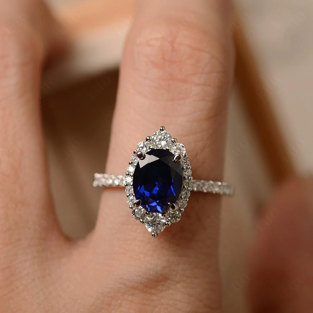 Oval Sapphire Halo Cluster Ring - Image 13