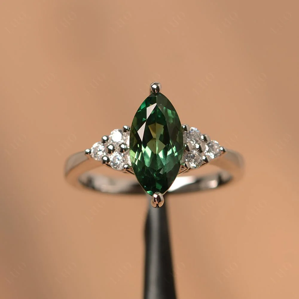 Large Marquise Cut Green Sapphire Ring - Image 29