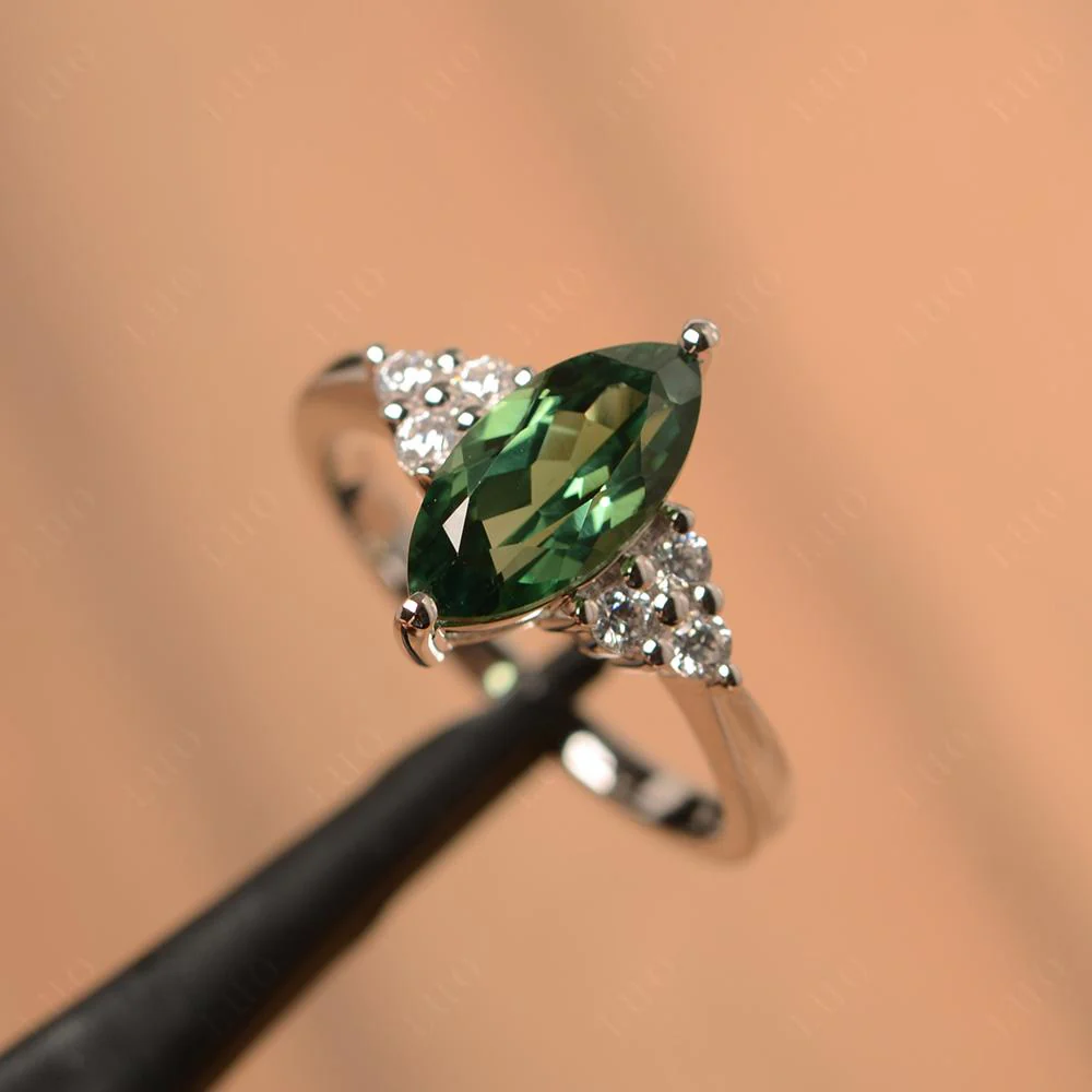 Large Marquise Cut Green Sapphire Ring - Image 30