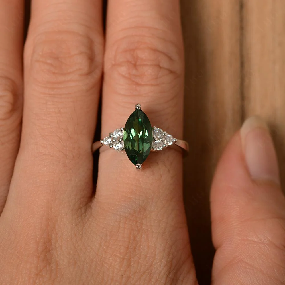 Large Marquise Cut Green Sapphire Ring - Image 32