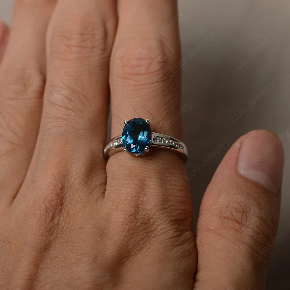 Classic Oval London Blue Topaz Engagement Ring - Image 4