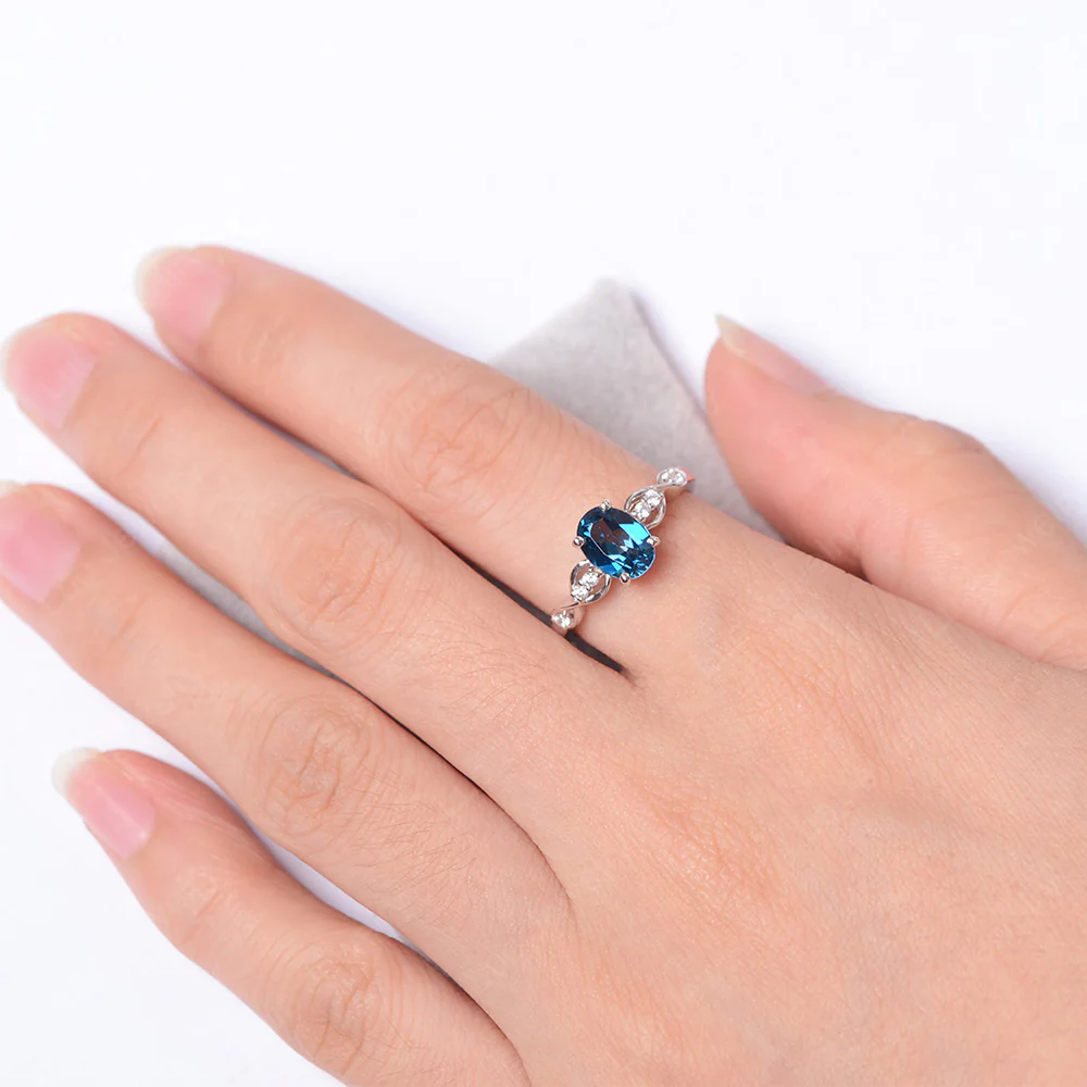 Oval London Blue Topaz Infinity Engagement Ring - Image 4