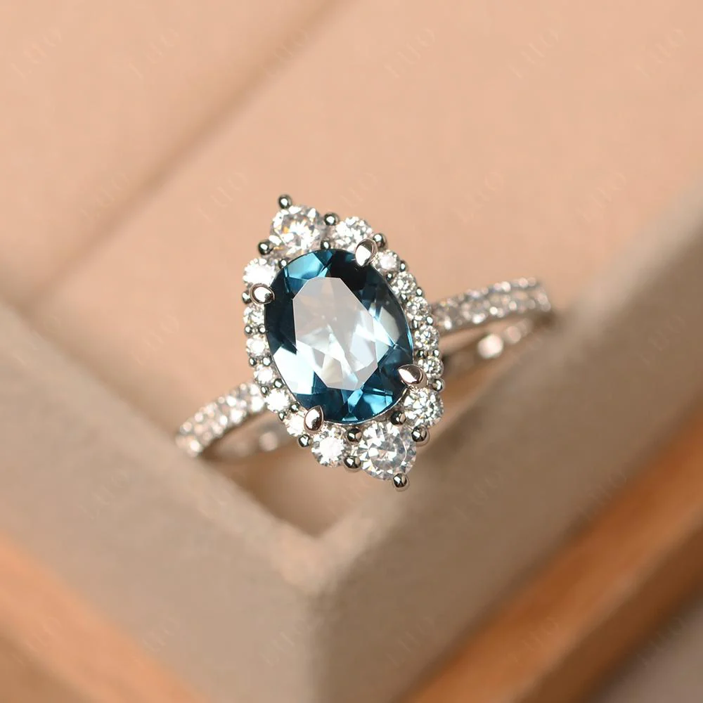 Oval London Blue Topaz Halo Cluster Ring - Image 10