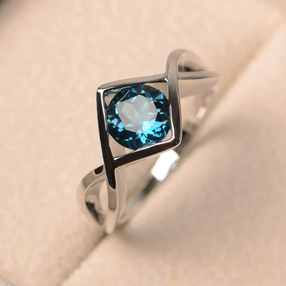 London Blue Topaz Bezel Set Infinity Solitaire Ring - Image 10