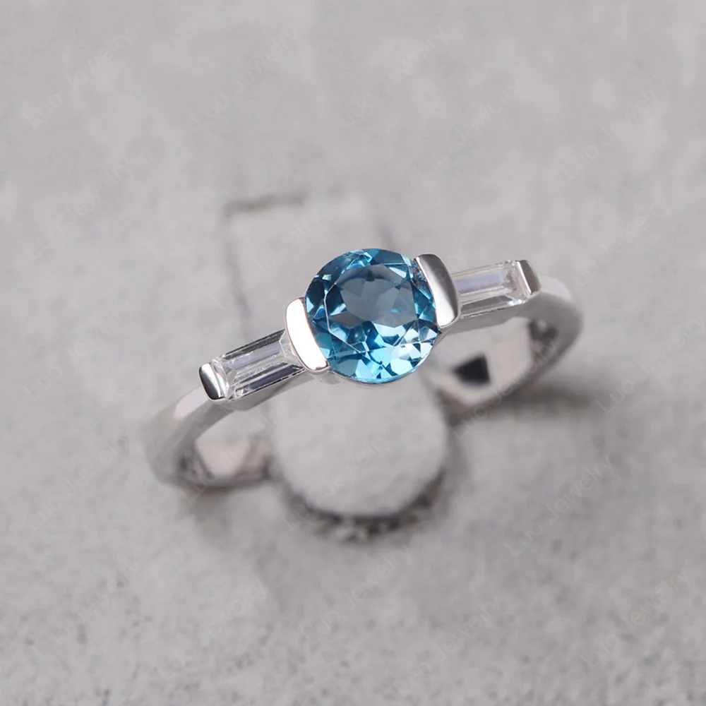 London Blue Topaz Ring Round Cut with Baguette Side