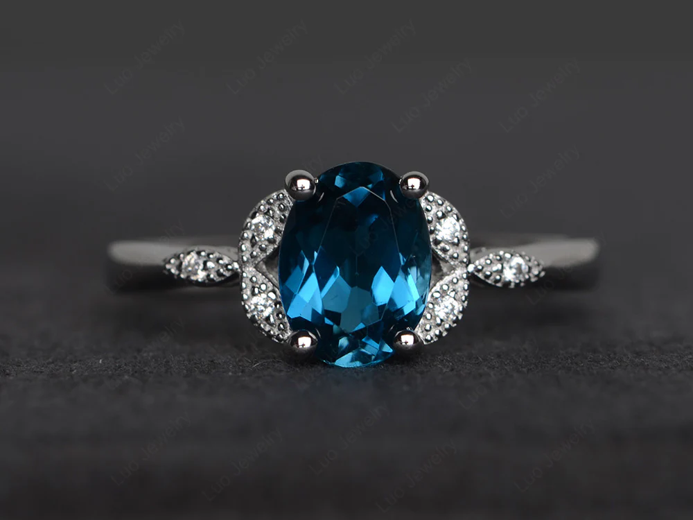 Oval London Blue Topaz Leaf Engagement Ring