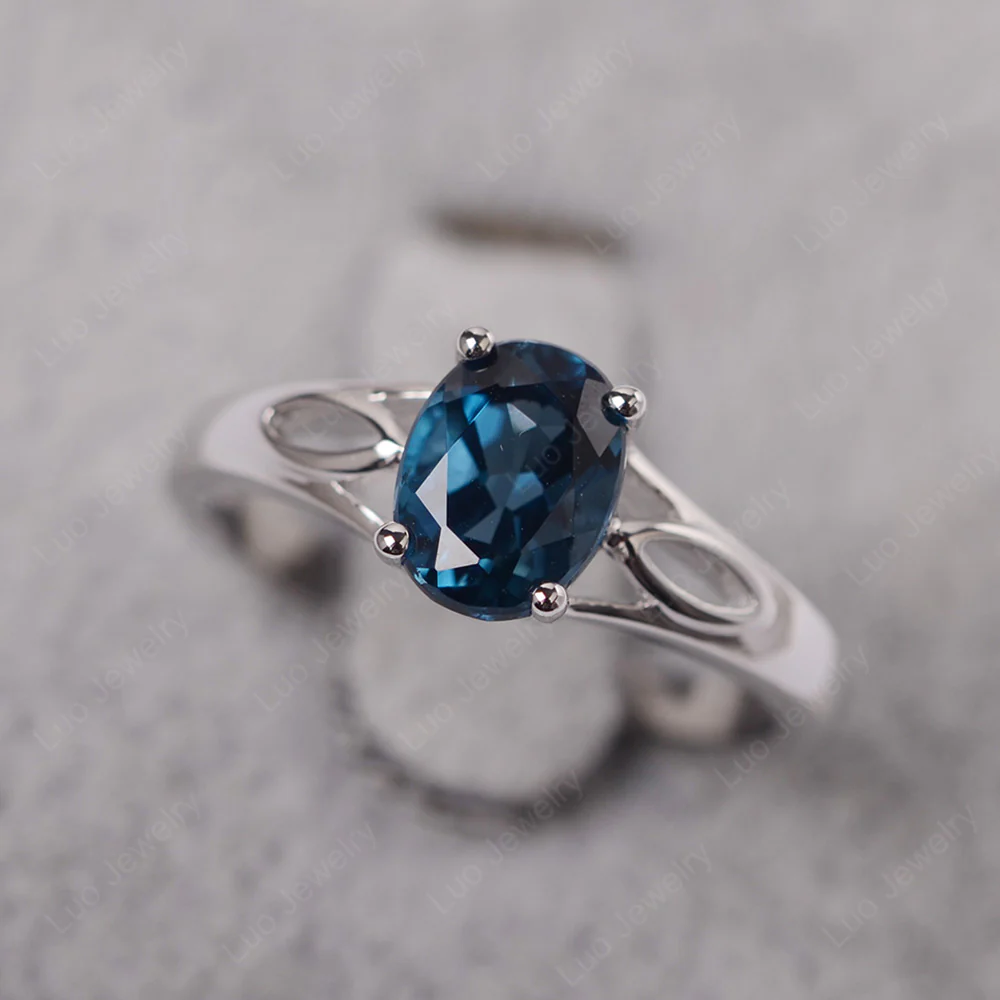 Oval London Blue Topaz Solitaire Split Shank Ring