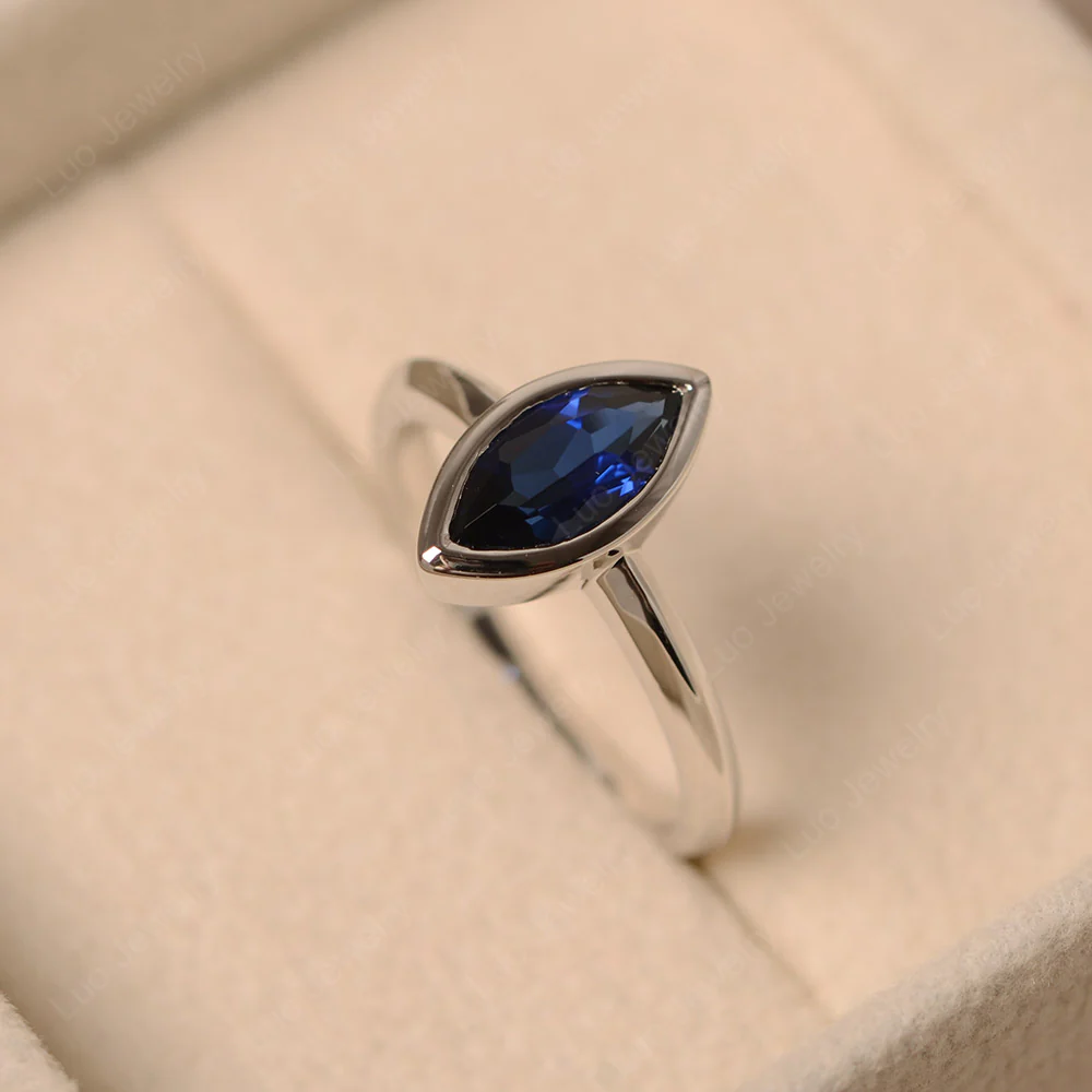 Marquise Cut Sapphire Bezel Set Ring - Image 3