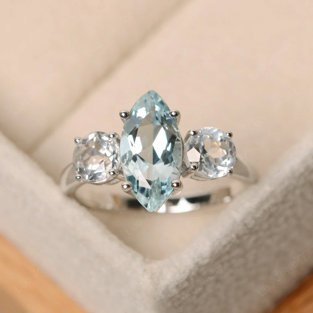 Marquise Cut Three Stone Aquamarine Ring