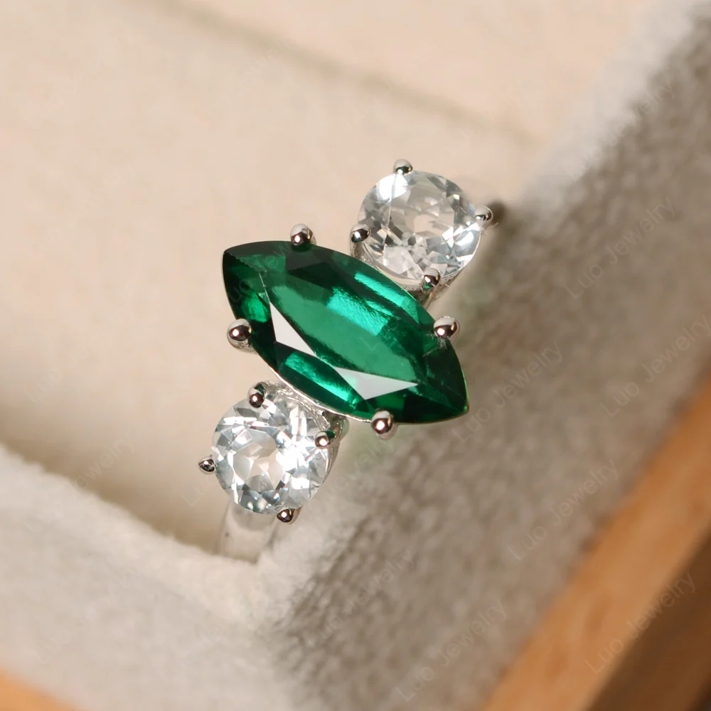 Marquise Cut Three Stone Emerald Ring