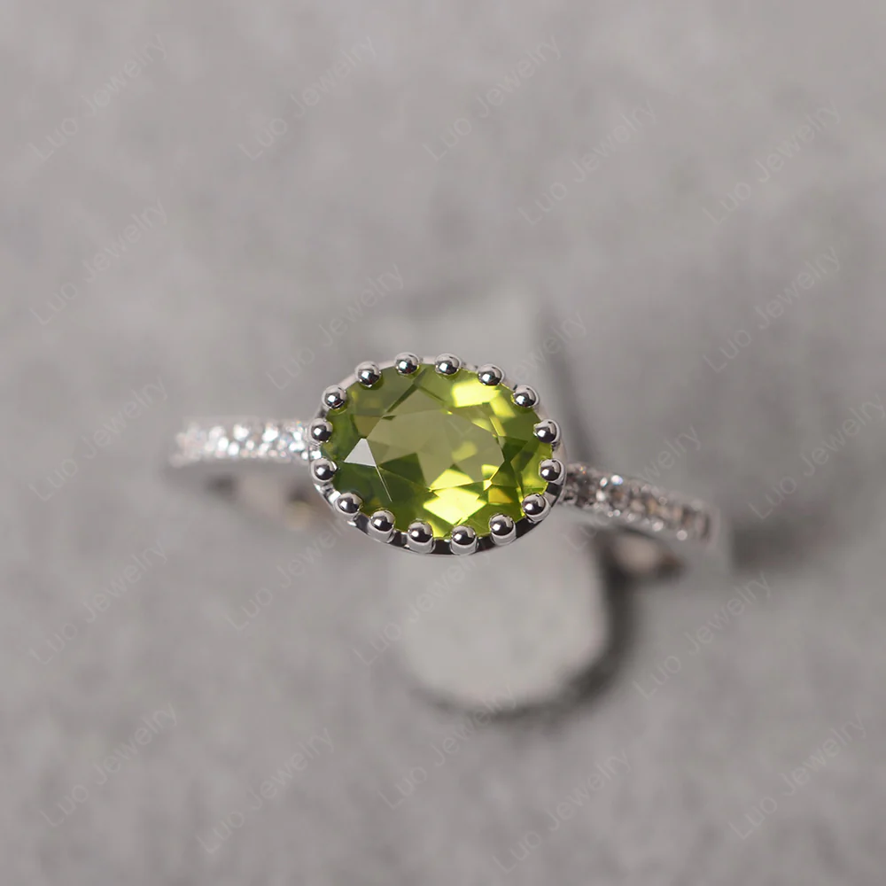 Multi Prong Oval Cut Peridot Ring