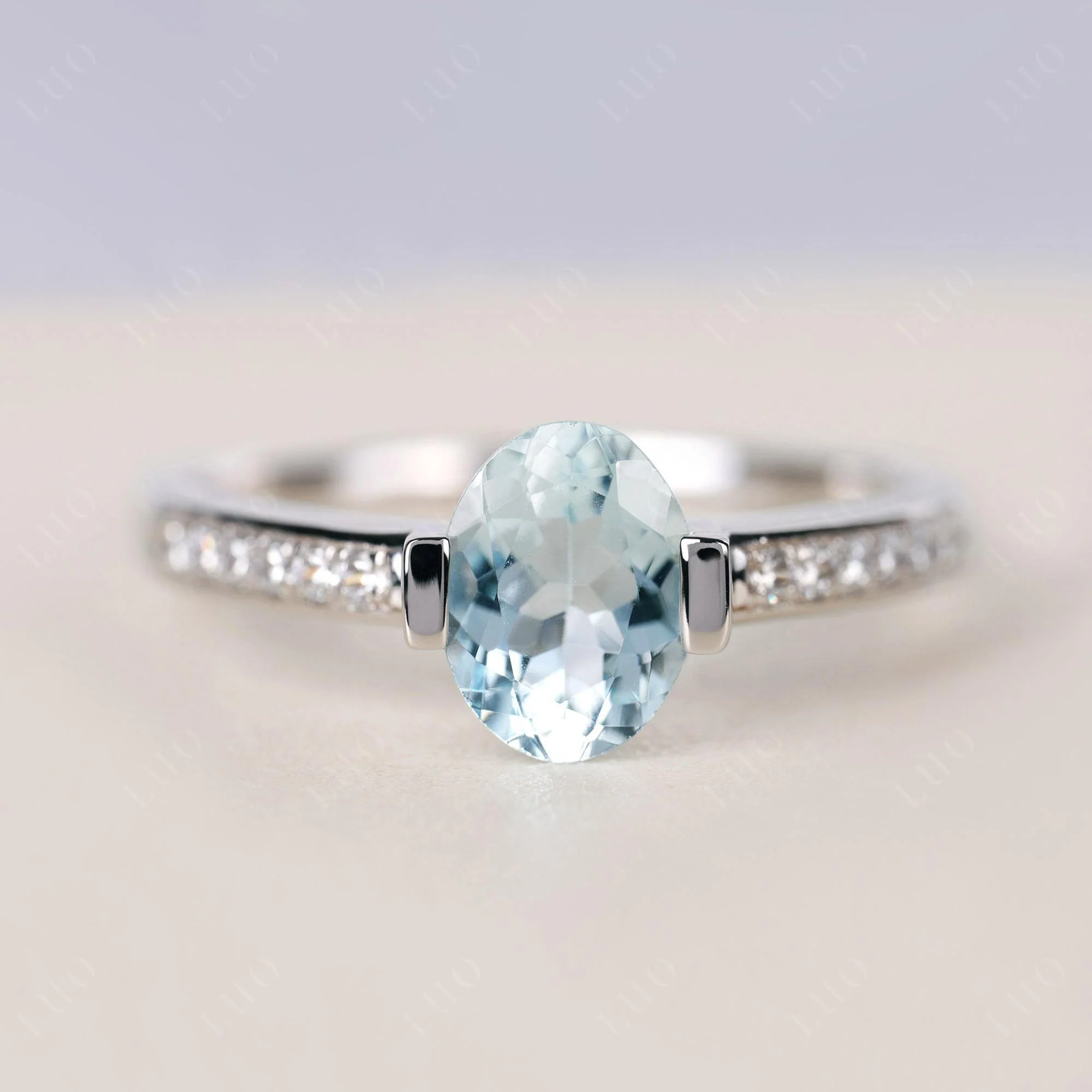 Oval Aquamarine Engagement Ring Half Bezel Set