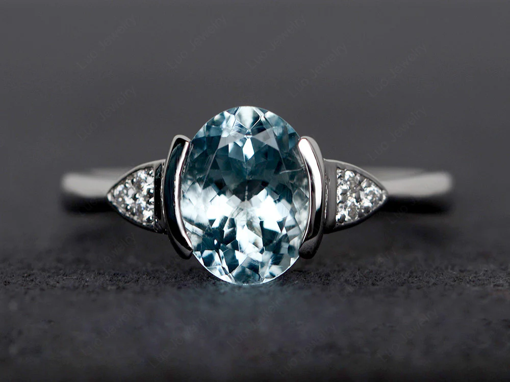 Oval Aquamarine Half Bezel Set Ring