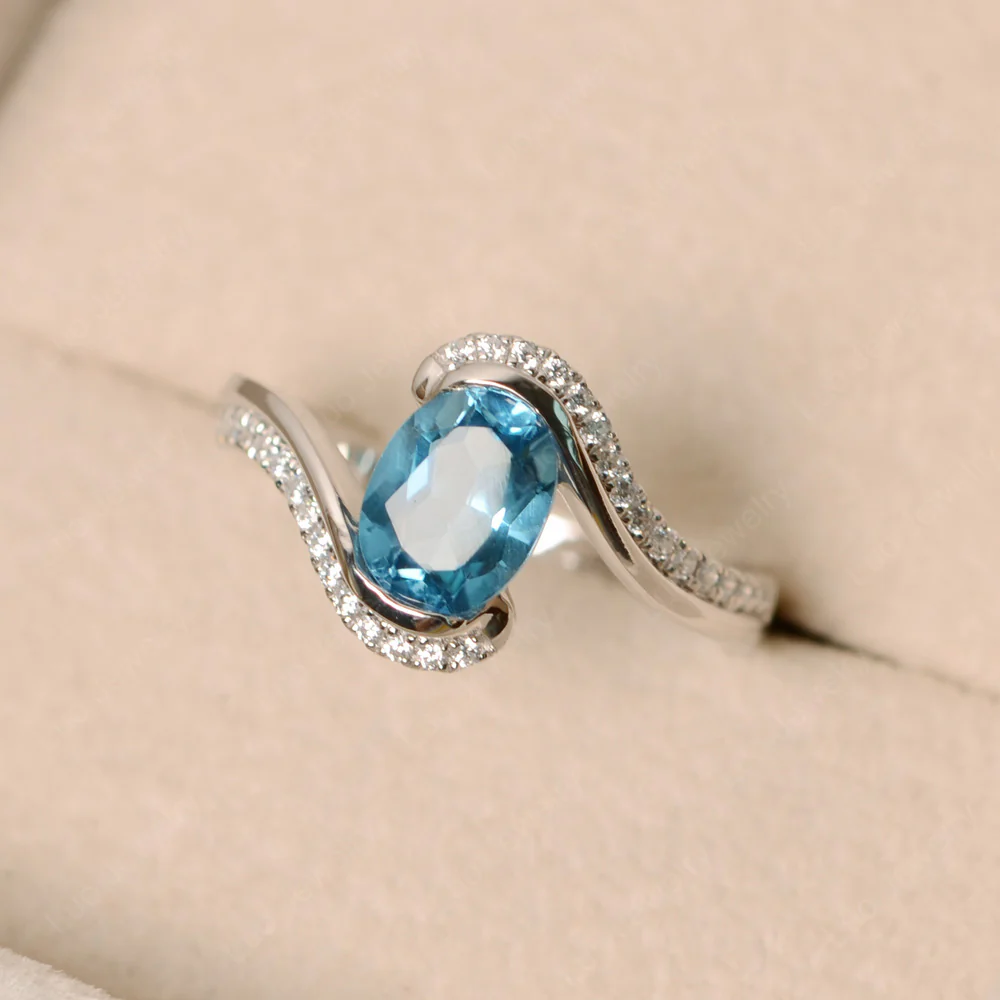 Oval Bezel Swiss Blue Topaz Engagement Ring - Image 3