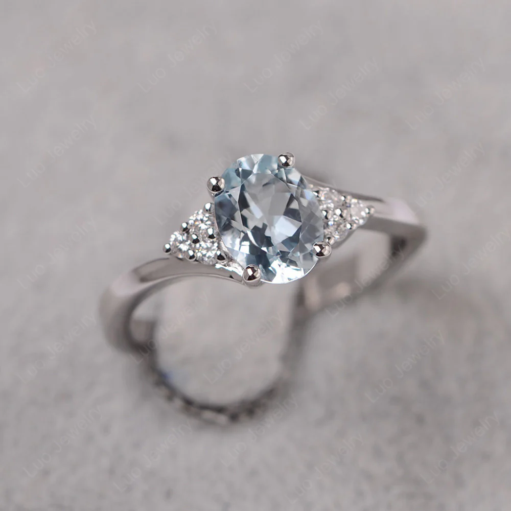 Oval Aquamarine Bypass Engagement Ring