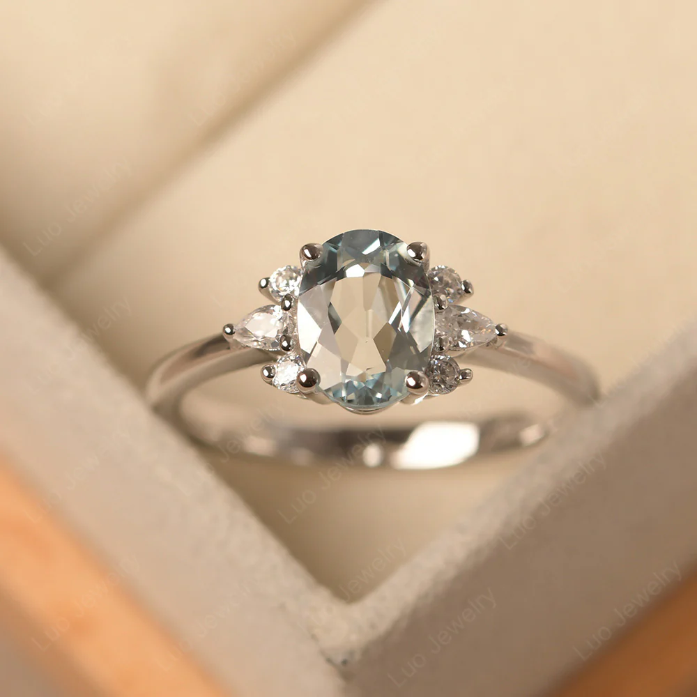 Oval Aquamarine Ring with Pear Side Stone