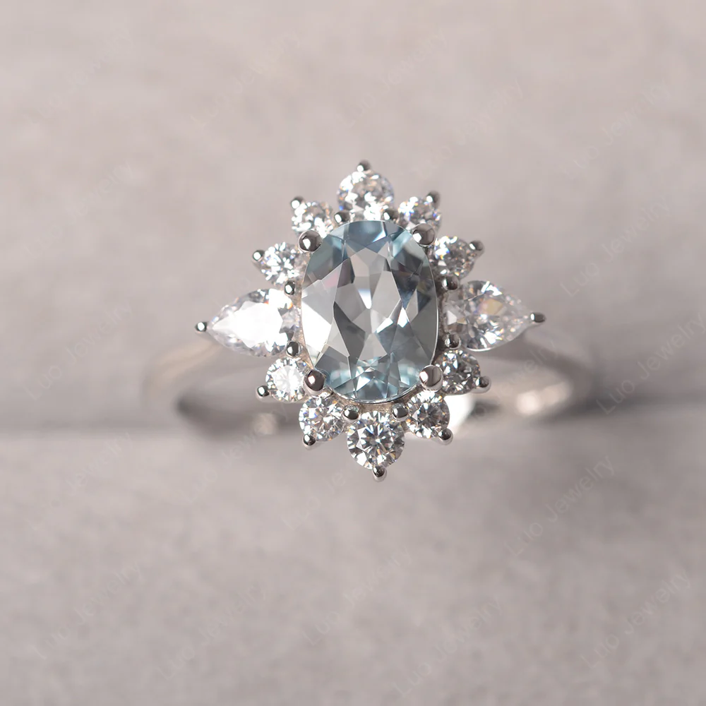 Oval Cut Aquamarine Ring with Pear Side Stone - Image 2