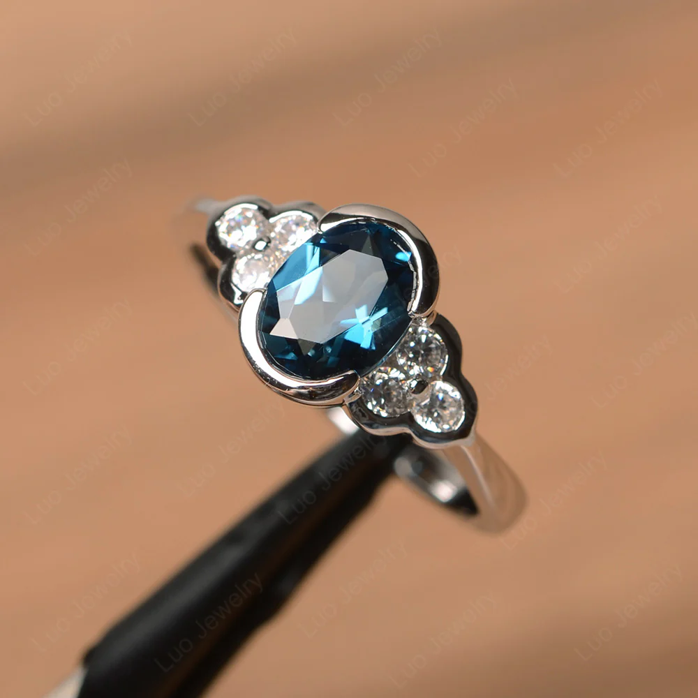 Oval Cut Bezel Set London Blue Topaz Engagement Ring - Image 2