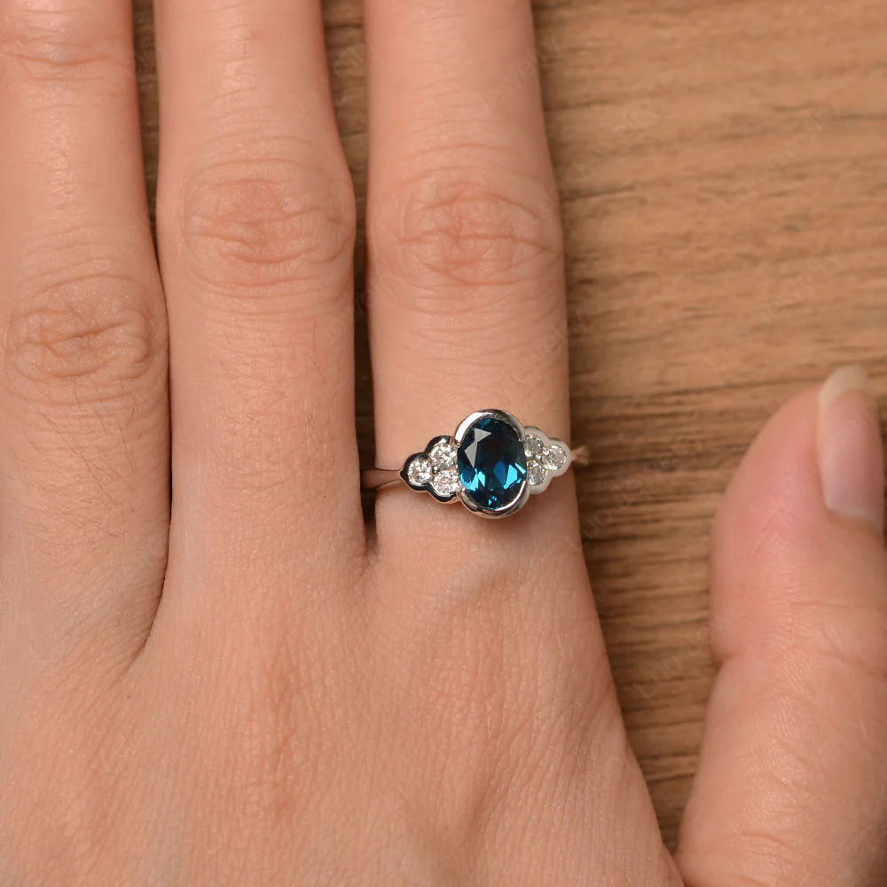 Oval Cut Bezel Set London Blue Topaz Engagement Ring - Image 4