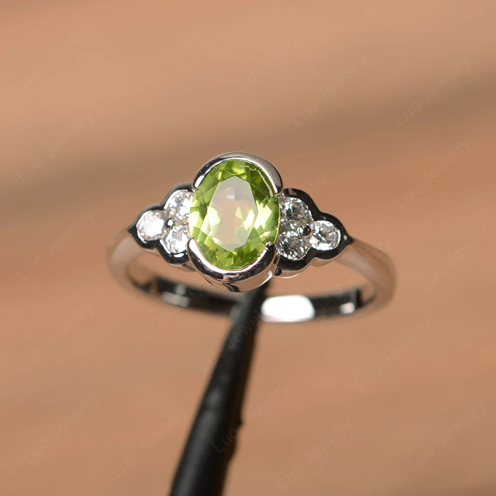 Oval Cut Bezel Set Peridot Engagement Ring