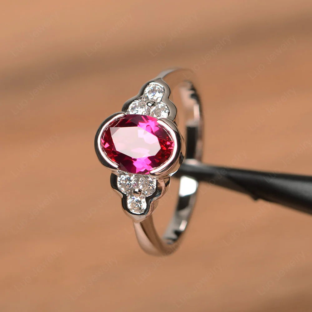 Oval Cut Bezel Set Ruby Engagement Ring