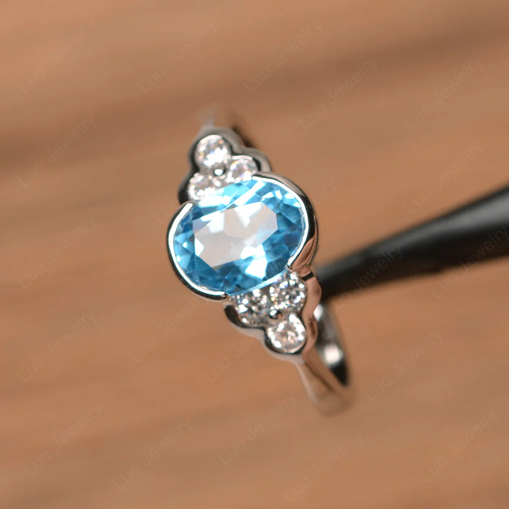 Oval Cut Bezel Set Swiss Blue Topaz Engagement Ring - Image 2