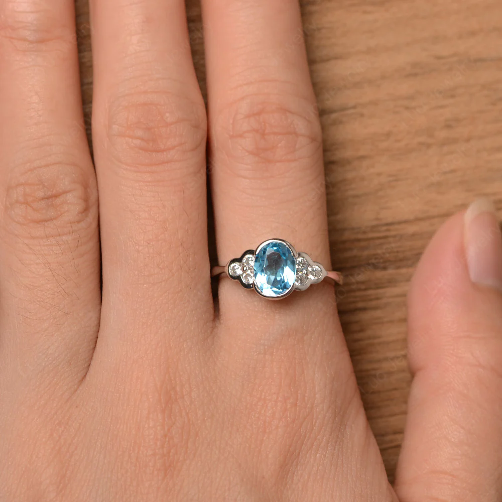 Oval Cut Bezel Set Swiss Blue Topaz Engagement Ring - Image 4