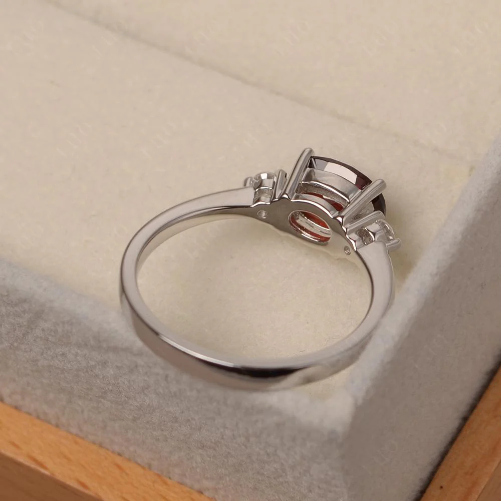 Oval East West Garnet Trilogy Ring - Image 13