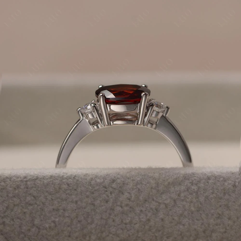 Oval East West Garnet Trilogy Ring - Image 14
