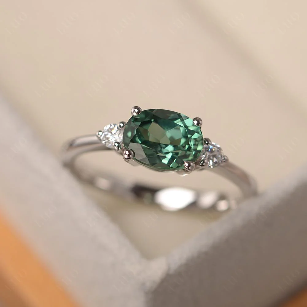 Oval East West Green Sapphire Trilogy Ring - Image 10