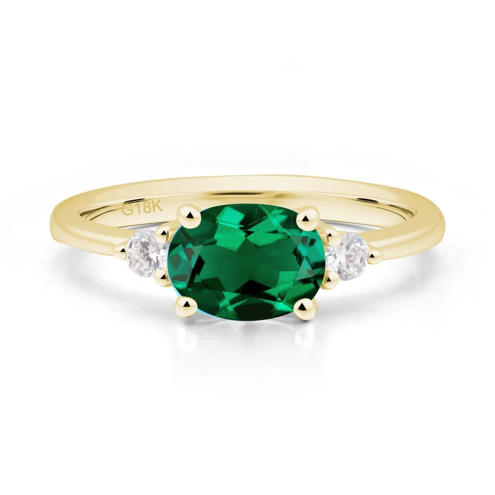 Oval East West Emerald Trilogy Ring - Image 3