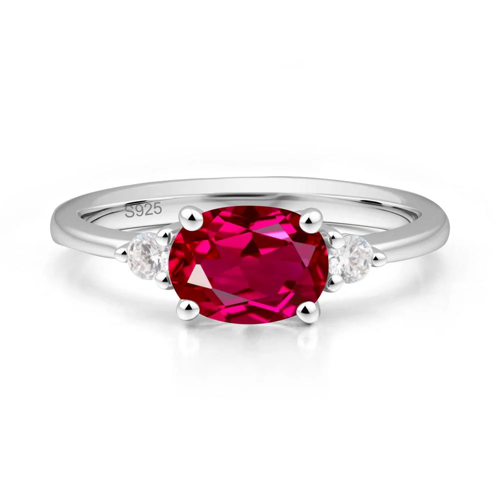Oval East West Ruby Trilogy Ring