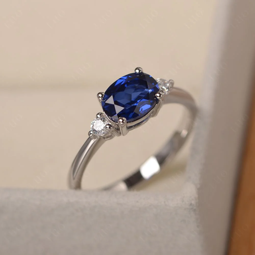 Oval East West Sapphire Trilogy Ring - Image 11
