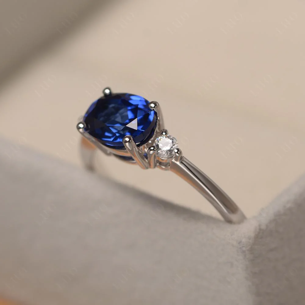 Oval East West Sapphire Trilogy Ring - Image 12