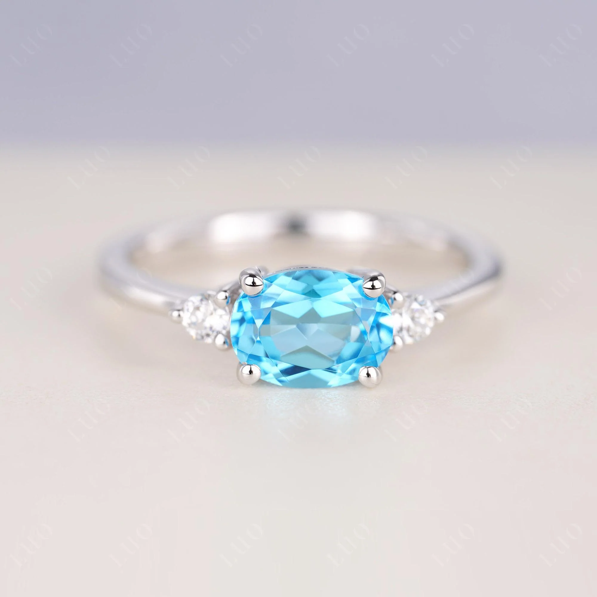 Oval East West Swiss Blue Topaz Trilogy Ring - Image 10