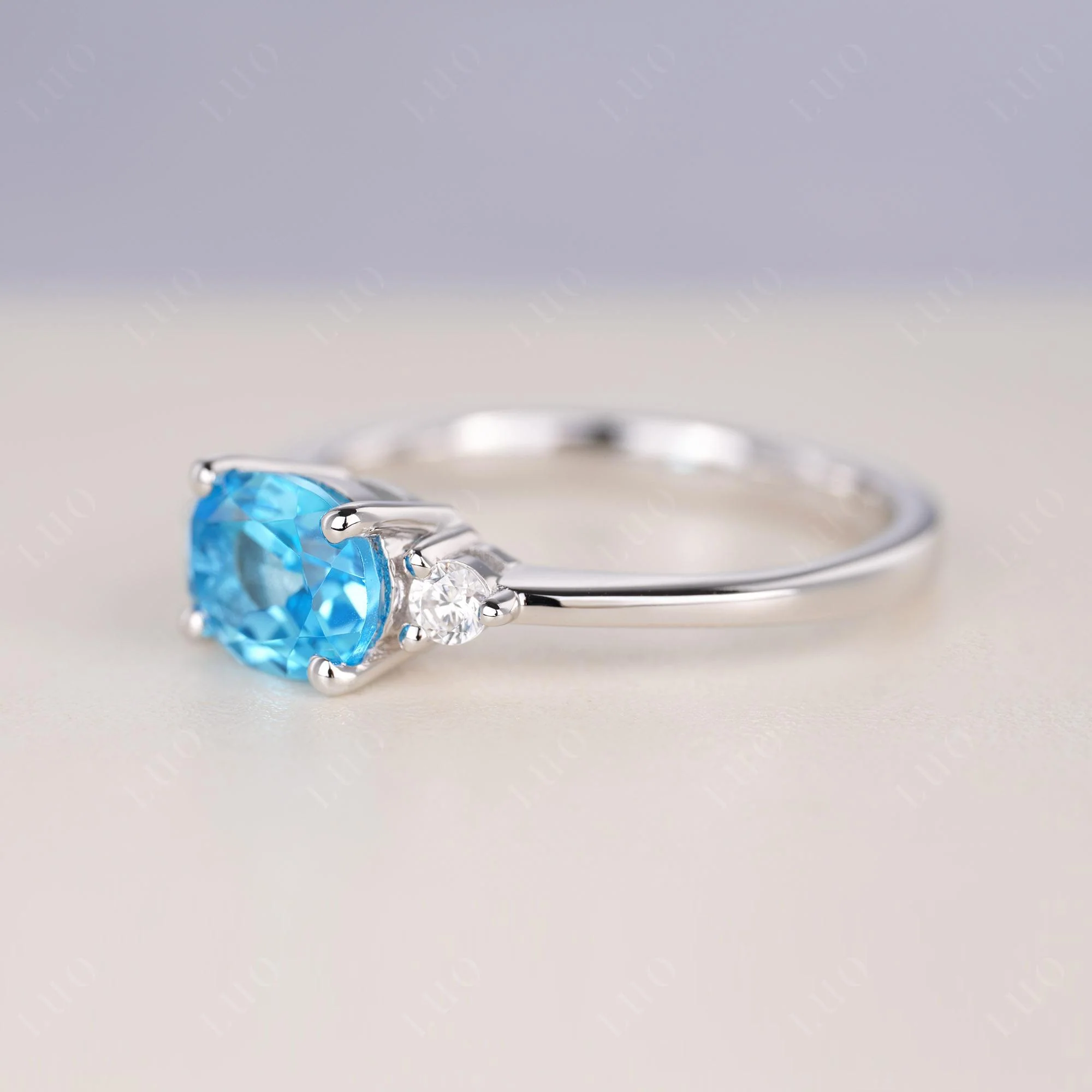 Oval East West Swiss Blue Topaz Trilogy Ring - Image 11