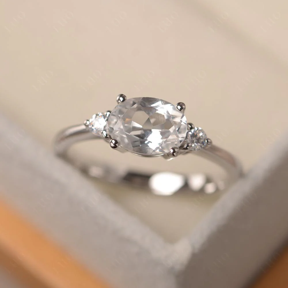 Oval East West White Topaz Trilogy Ring - Image 10